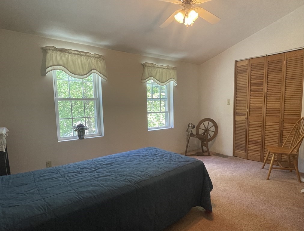 95 West Gill Road Gill, MA 01354 - Photo 16 of 40 a bedroom with a bed and a window