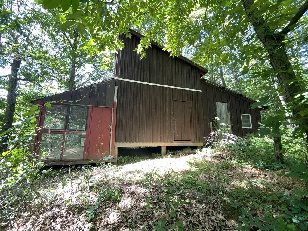 95 West Gill Road Gill, MA 01354 - Photo 20 of 40 a backyard of a house with lots of green space