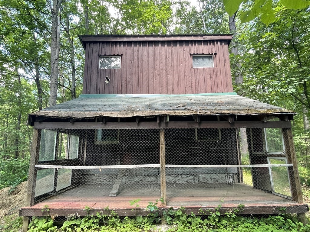 95 West Gill Road Gill, MA 01354 - Photo 21 of 40 a small barn in front of a house with a small yard