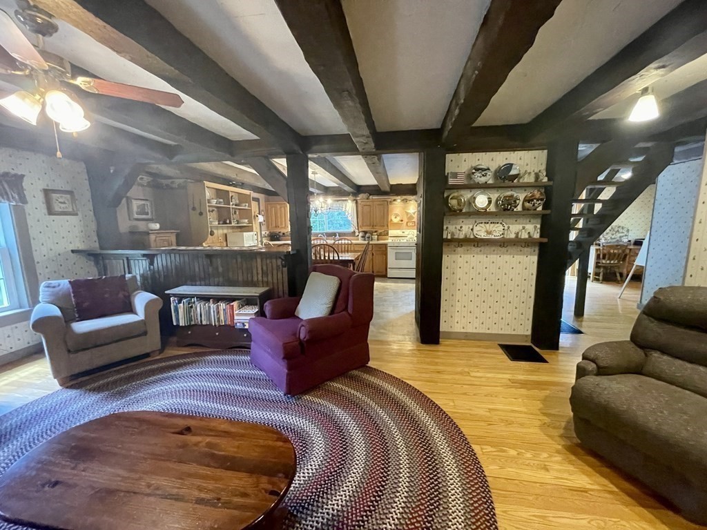 95 West Gill Road Gill, MA 01354 - Photo 4 of 40 a living room with furniture and a fireplace