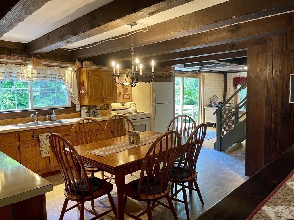 95 West Gill Road Gill, MA 01354 - Photo 8 of 40 a view of a dining room with furniture window and outside view