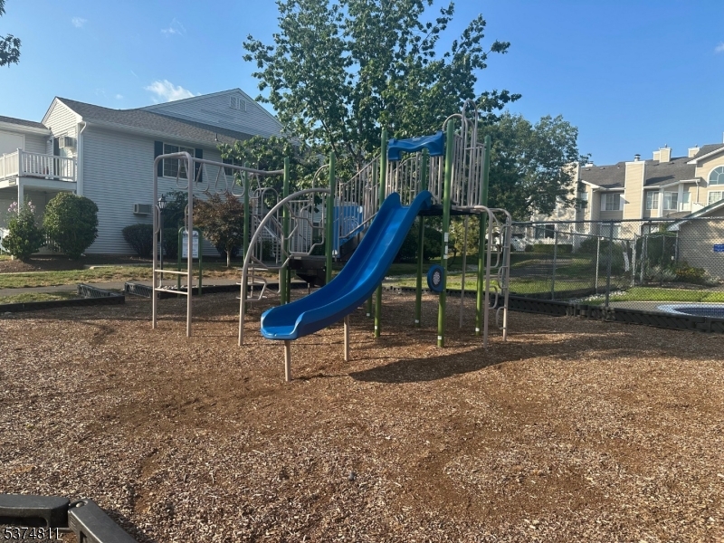66 Mountain Court, Unit 66 Bedminster, NJ 07921 - Photo 16 of 18 a view of a park with slide