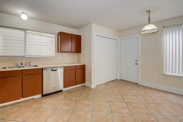 a view of a kitchen with a sink