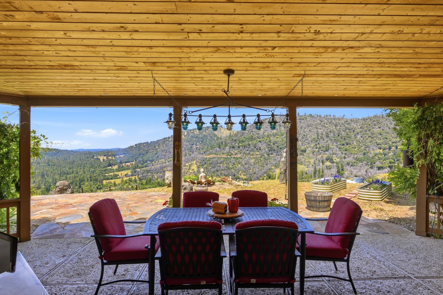 7201 Happy Valley Road Somerset, CA 95684 - Photo 38 of 75 The view of the valley and sunset from this dining area is so incredibly special.