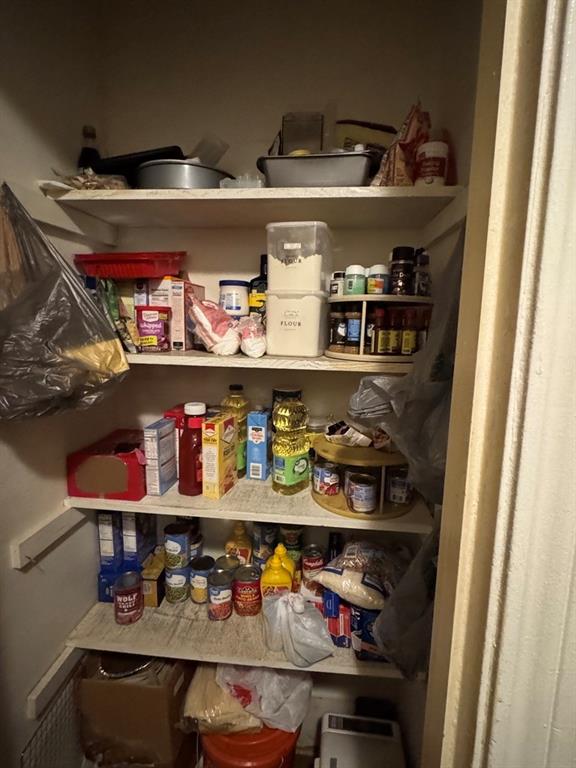 2429 February Lane Grand Prairie, TX 75050 - Photo 11 of 14 a shelf with cup and plates