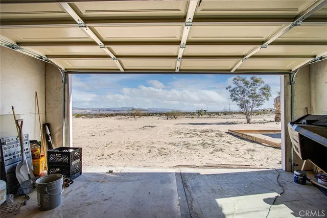 a view of a swimming pool with a lounge chair