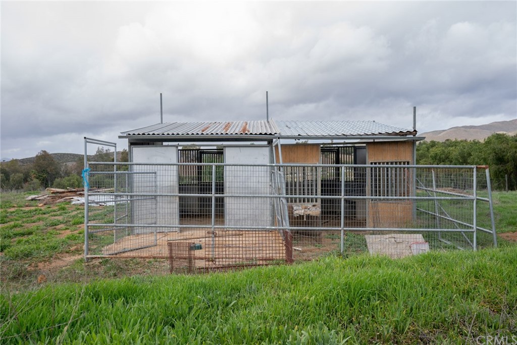 33796 Arthur Road Winchester, CA 92596 - Photo 29 of 54 a front view of a house with a garden