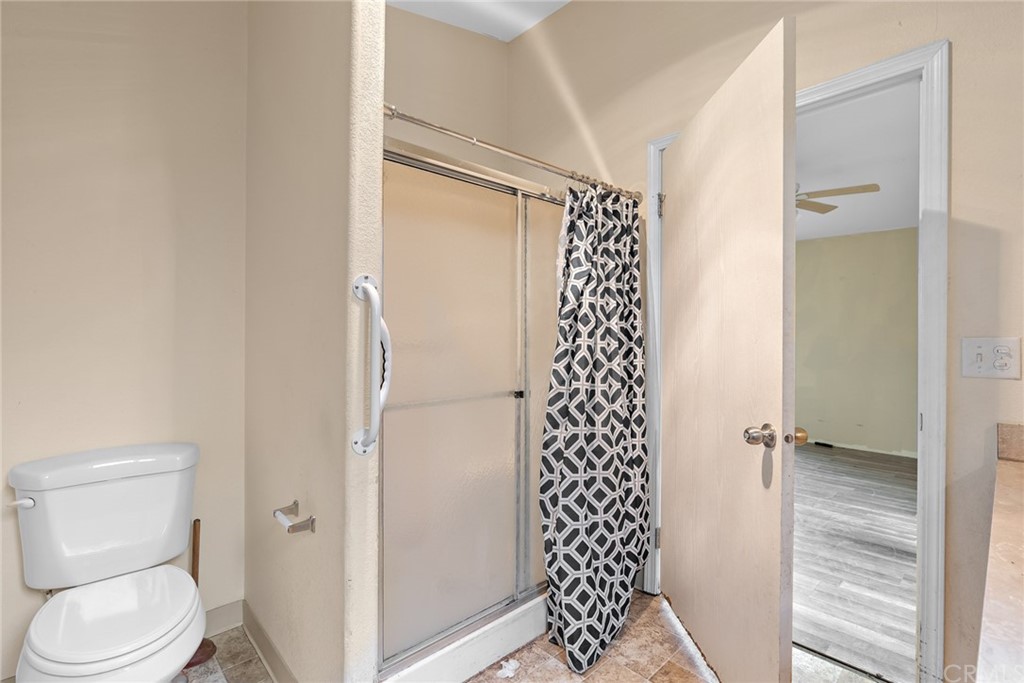 33796 Arthur Road Winchester, CA 92596 - Photo 42 of 54 a bathroom with a shower toilet and sink