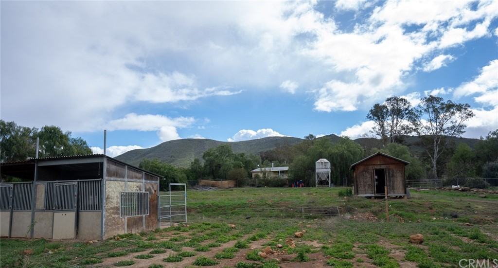 33796 Arthur Road Winchester, CA 92596 - Photo 53 of 54 a view of a yard in front of a house with a large tree