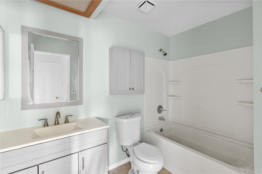 33796 Arthur Road Winchester, CA 92596 - Photo 10 of 54 a bathroom with a sink a toilet and shower
