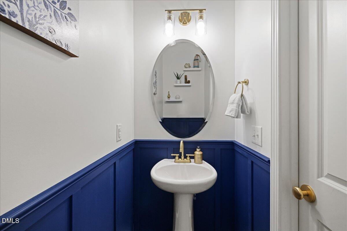 7804 Charters End Street Willow Spring, NC 27592 - Photo 16 of 43 Half bath downstairs