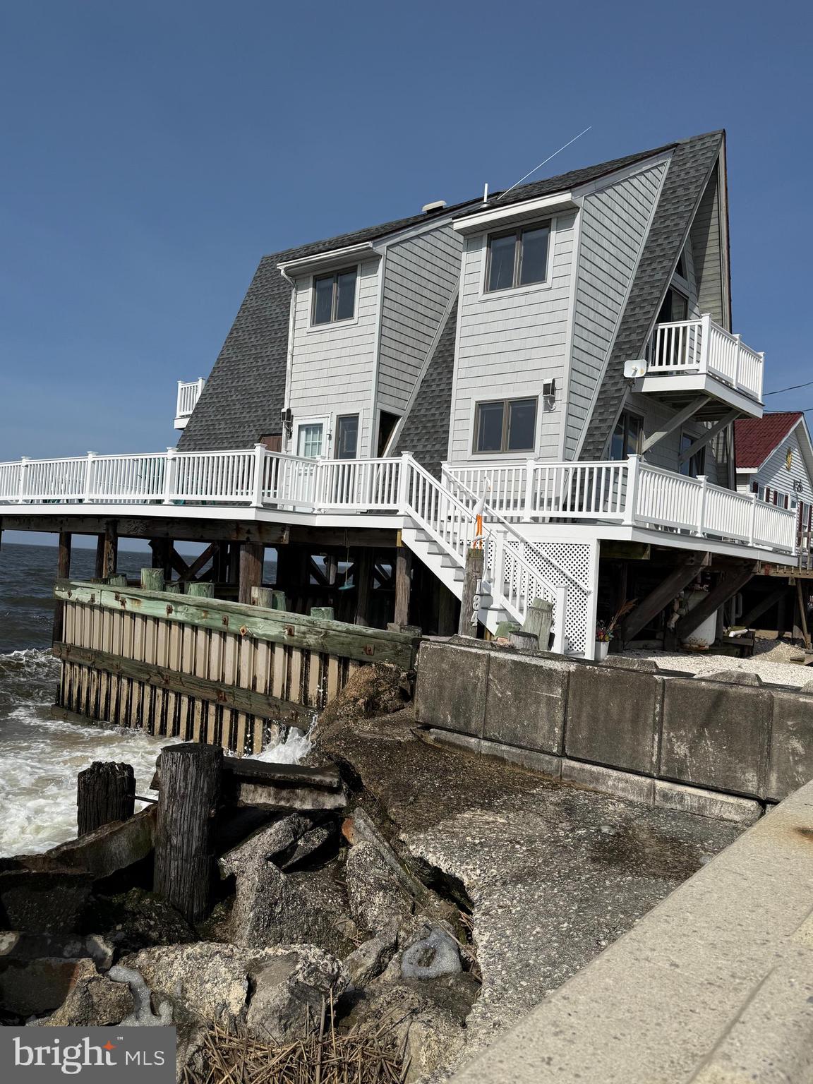 184 Cove Road Newport, NJ 08345 - Photo 26 of 41 a front view of a house with a porch