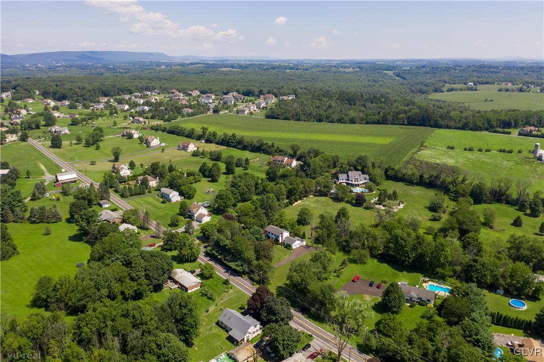 746 Bushkill Center Road Nazareth, PA 18064 - Photo 19 of 49 an aerial view of a houses with outdoor space and mountain view