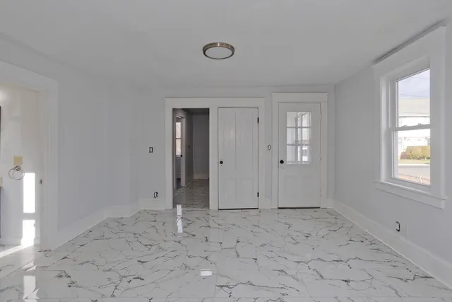 a view of an empty room with window