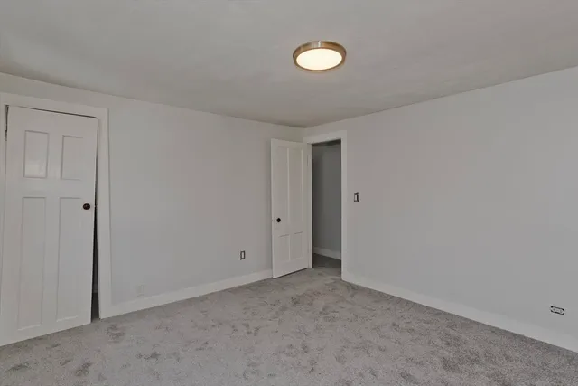 a view of a room with a door