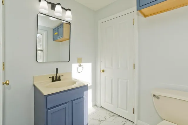 a view of empty room with windows