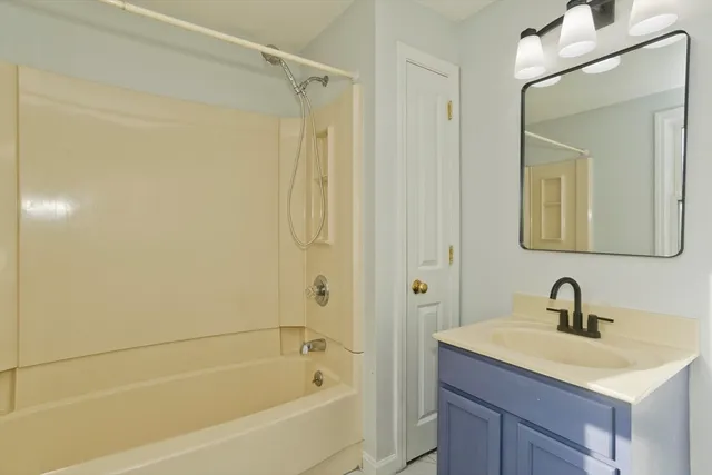 a view of a house with backyard porch and sitting area