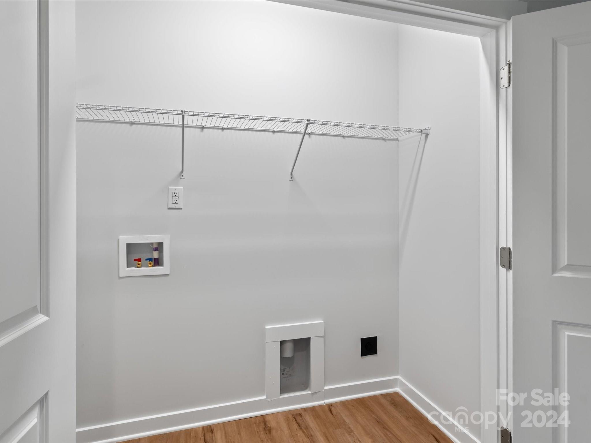 230 Gilead Road Huntersville, NC 28078 - Photo 12 of 19 a view of a room with racks on the wall