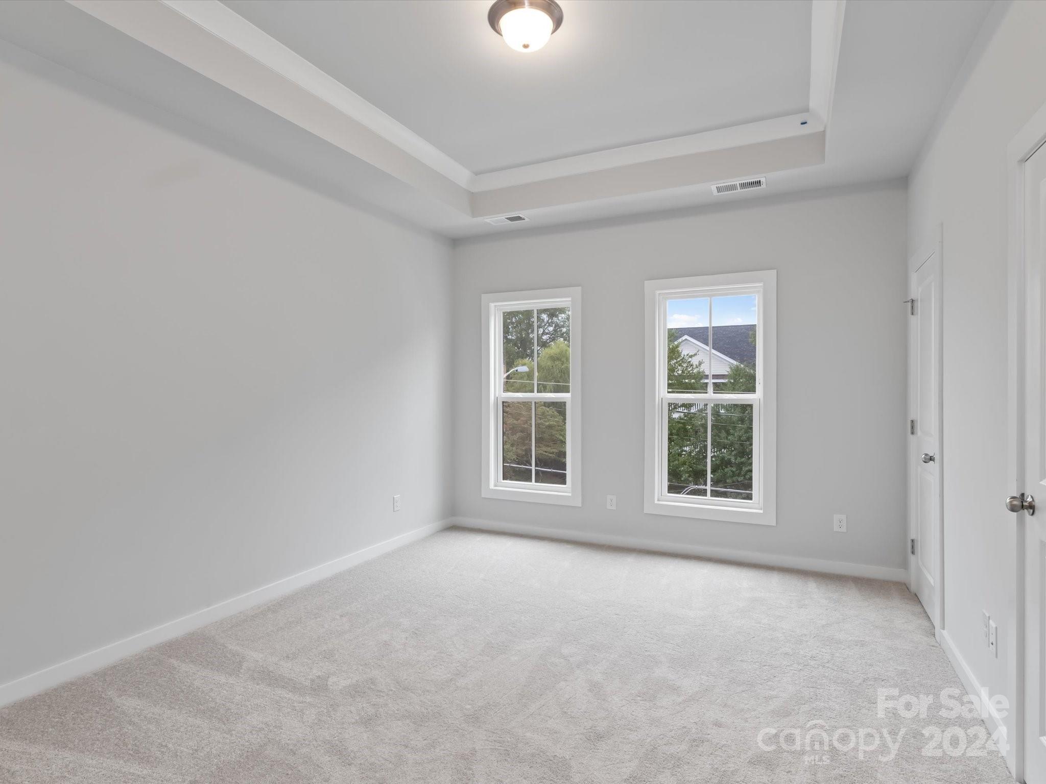 230 Gilead Road Huntersville, NC 28078 - Photo 16 of 19 an empty room with a window