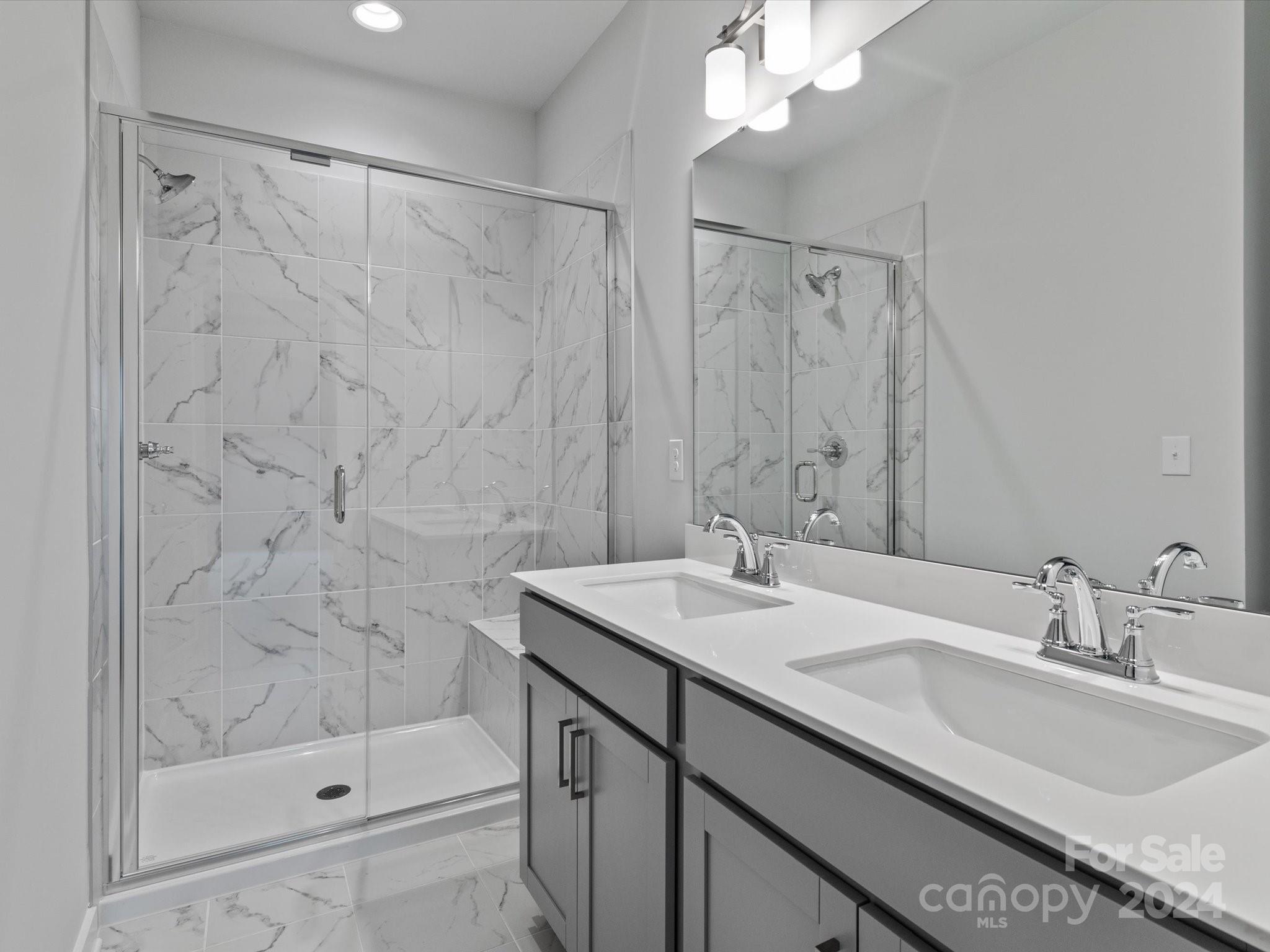 230 Gilead Road Huntersville, NC 28078 - Photo 18 of 19 a bathroom with a sink and a mirror