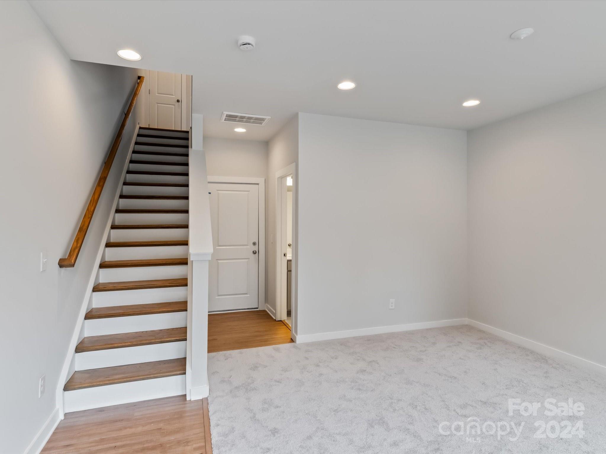 230 Gilead Road Huntersville, NC 28078 - Photo 3 of 19 an entryway in a hall with a window