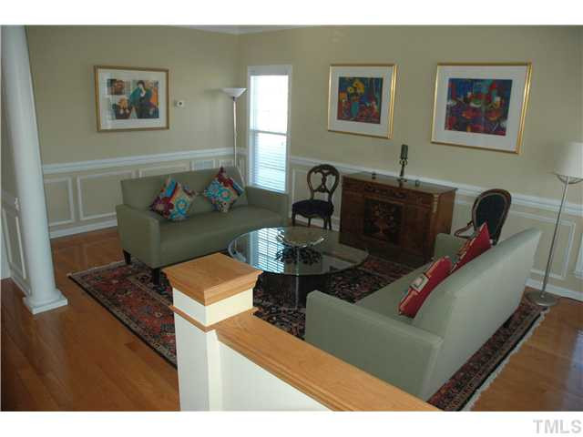10702 Friendly Neighbor Lane Raleigh, NC 27614 - Photo 5 of 25 Living room adjacent to dining is open and inviting. Living Room