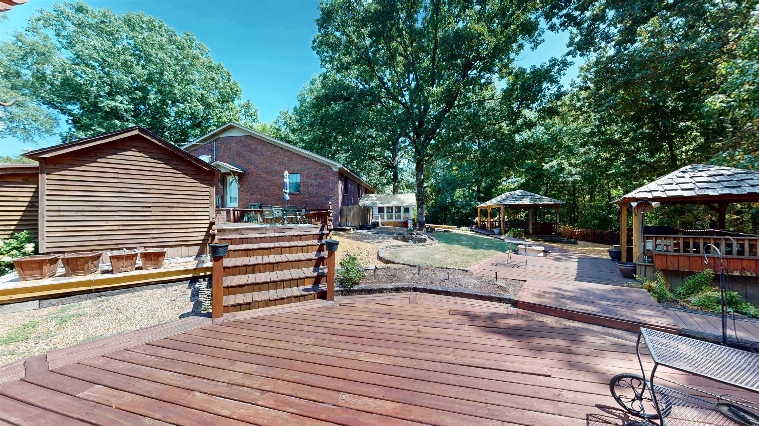 420 Joann Road Somerville, TN 38068 - Photo 27 of 40 Expansive wood-finish decking with multiple levels