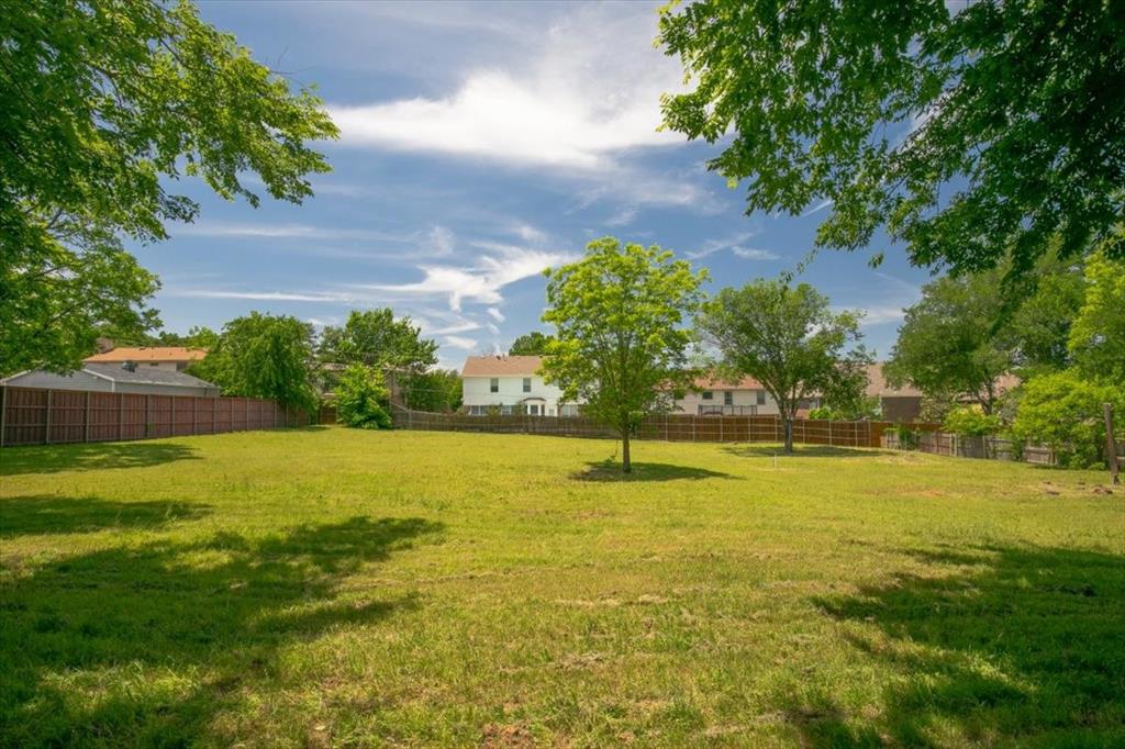 1000 Hughes Road Grapevine, TX 76051 - Photo 6 of 15 a swimming pool with an outdoor space