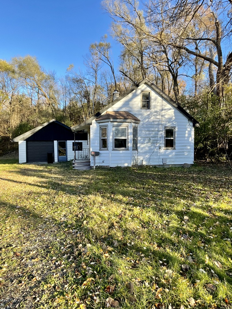 908 Spring Beach Way Cary, IL 60013 - Photo 2 of 2 a front view of a house with a yard