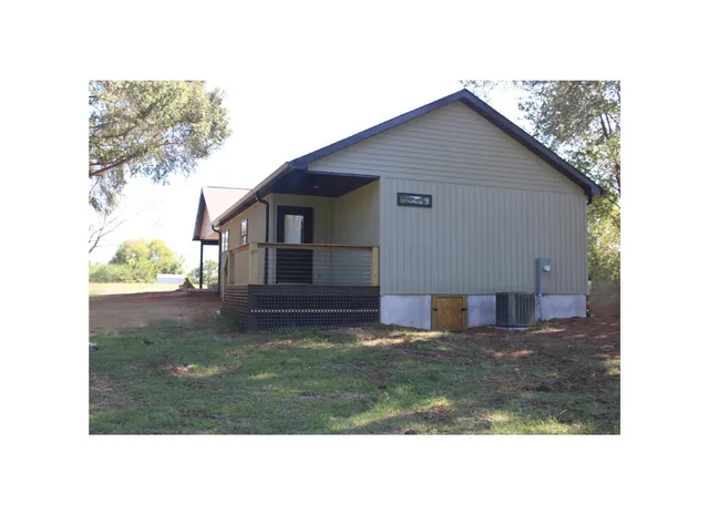 a black and white photo of a house