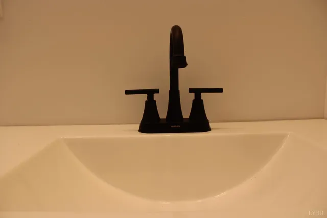 a bathroom with a tub and a shower