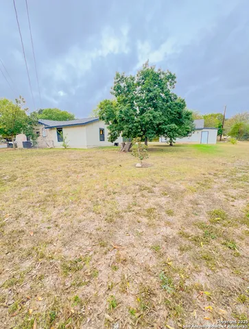 a view of an outdoor space and a yard