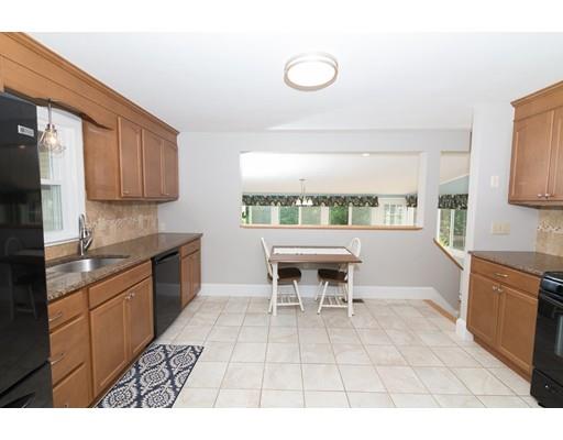 23 Hawthorne Road Ashland, MA 01721 - Photo 15 of 41 a kitchen with a sink and a stove top oven