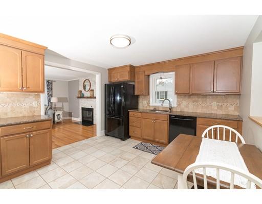 23 Hawthorne Road Ashland, MA 01721 - Photo 17 of 41 a kitchen with granite countertop a refrigerator stove top oven and sink