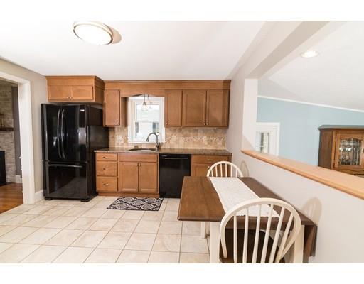 23 Hawthorne Road Ashland, MA 01721 - Photo 20 of 41 a kitchen with a sink stainless steel appliances and refrigerator