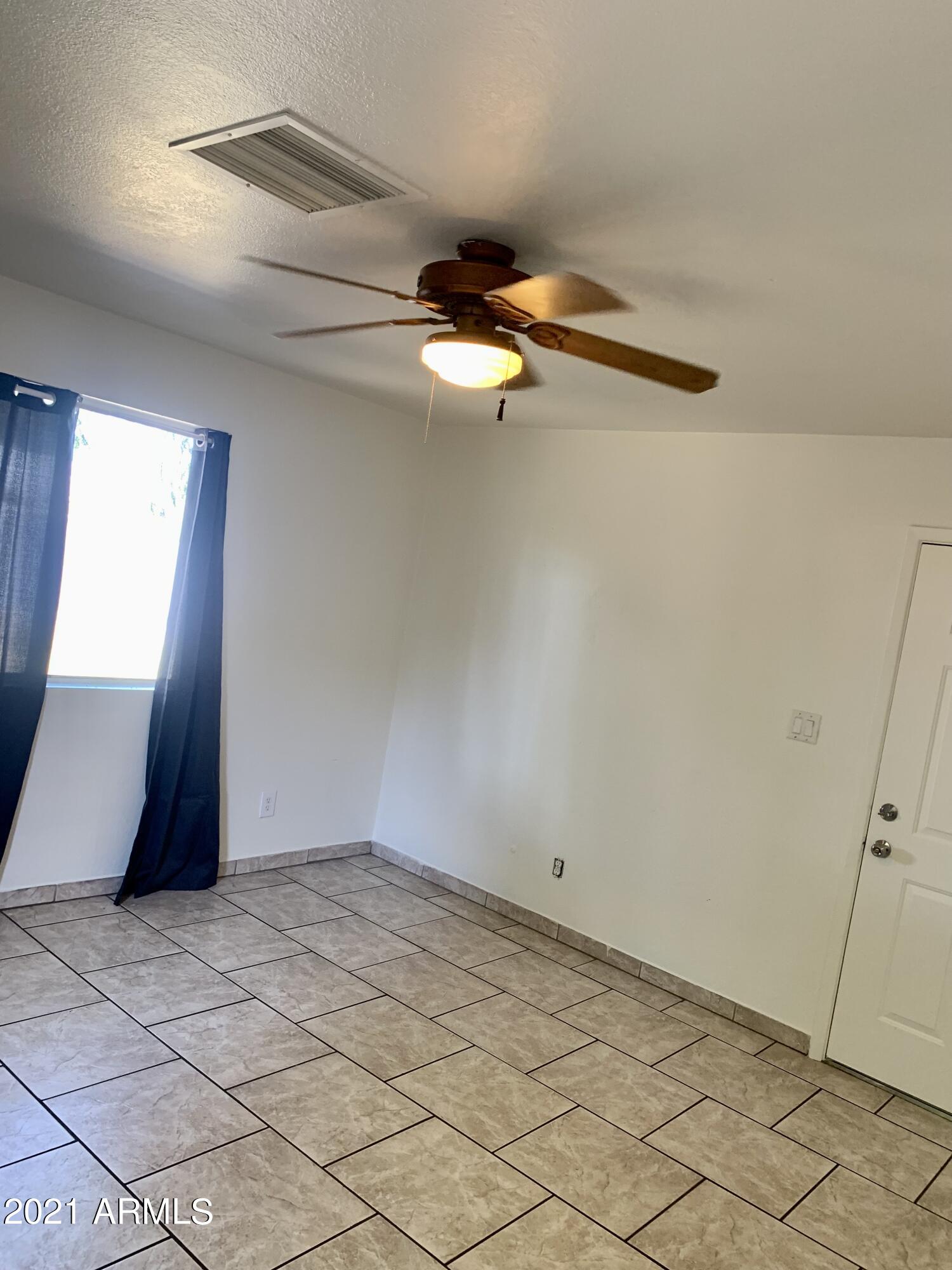 638 West Chipman Road Phoenix, AZ 85041 - Photo 13 of 20 4FEDC3F7-C4A8-491D-927D-75865DE9FF77
