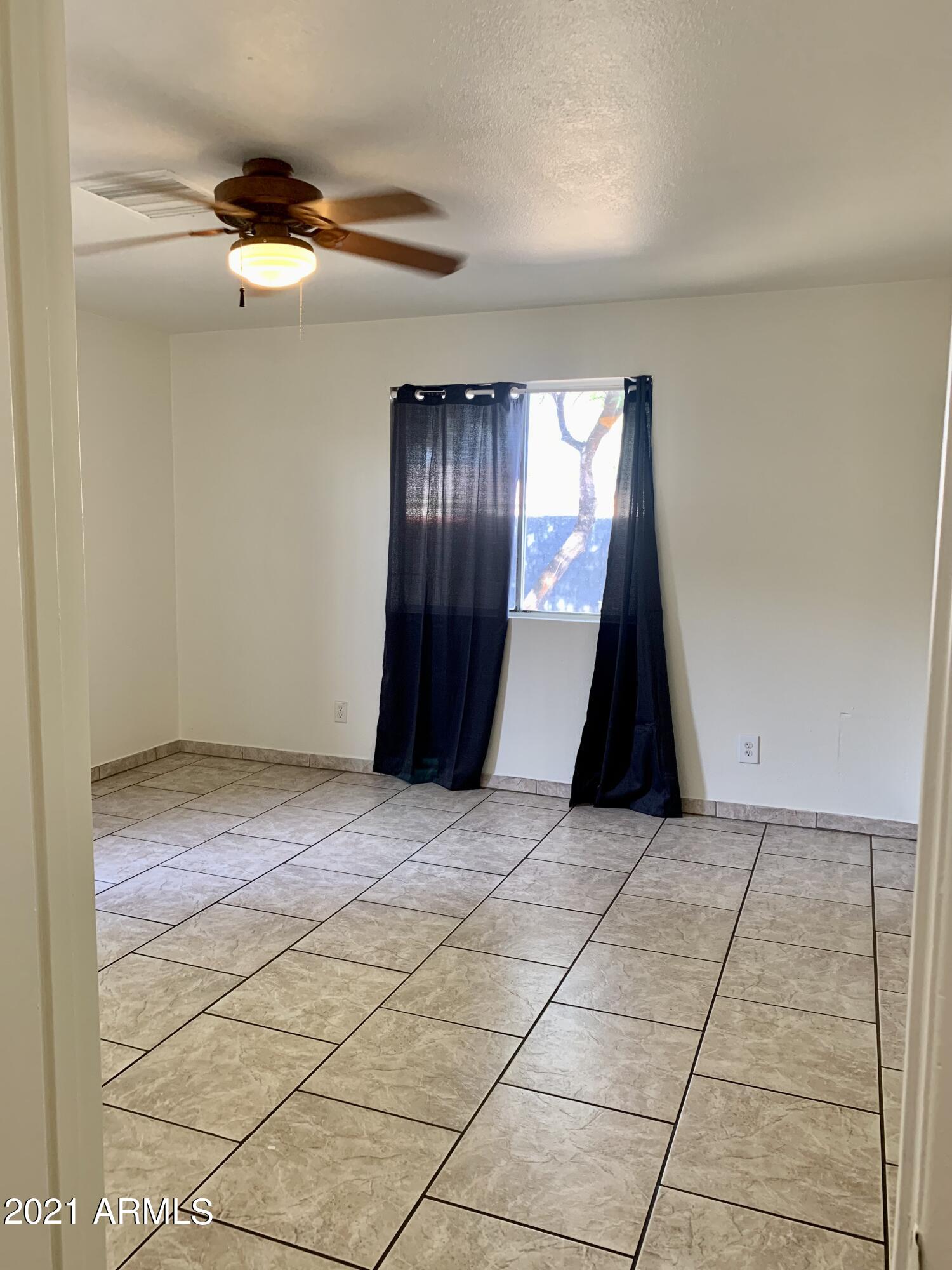 638 West Chipman Road Phoenix, AZ 85041 - Photo 14 of 20 42D79E1B-03AB-423C-A59E-92CB388DA74C