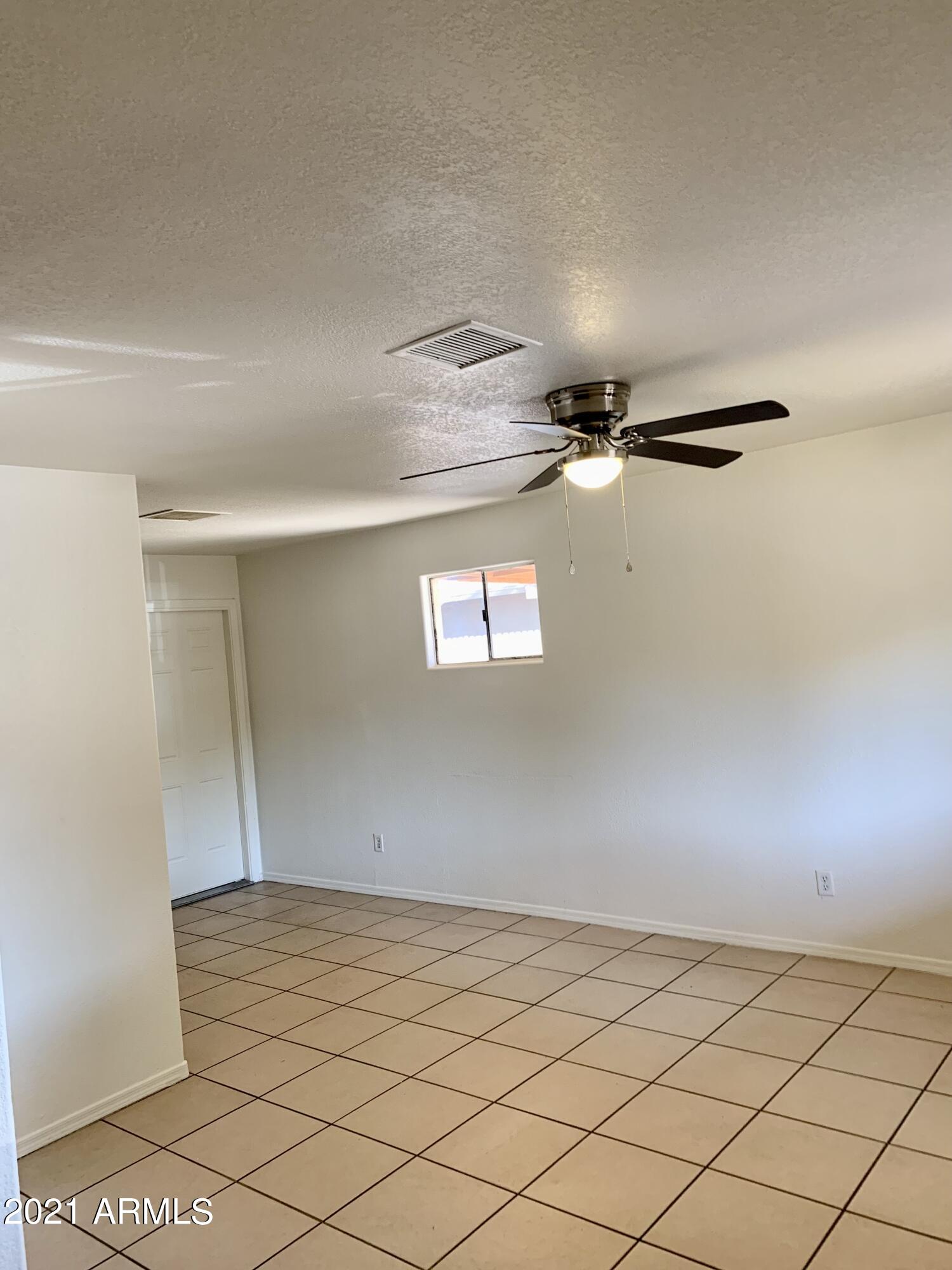 638 West Chipman Road Phoenix, AZ 85041 - Photo 5 of 20 EC7CFD58-DF49-4497-B3B2-6D5D9C94EE2E