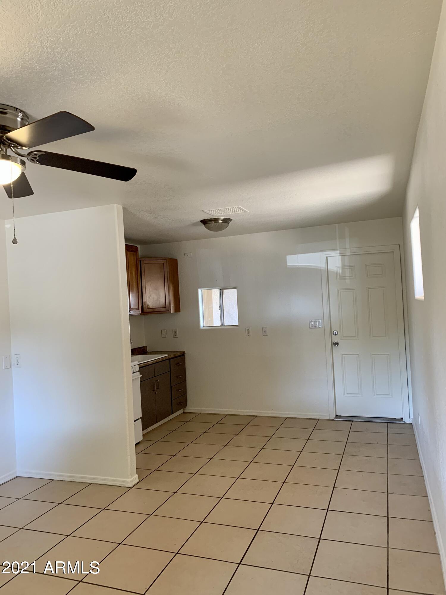 638 West Chipman Road Phoenix, AZ 85041 - Photo 7 of 20 00A16B7D-1819-48B1-9F0C-AD784475AAAC