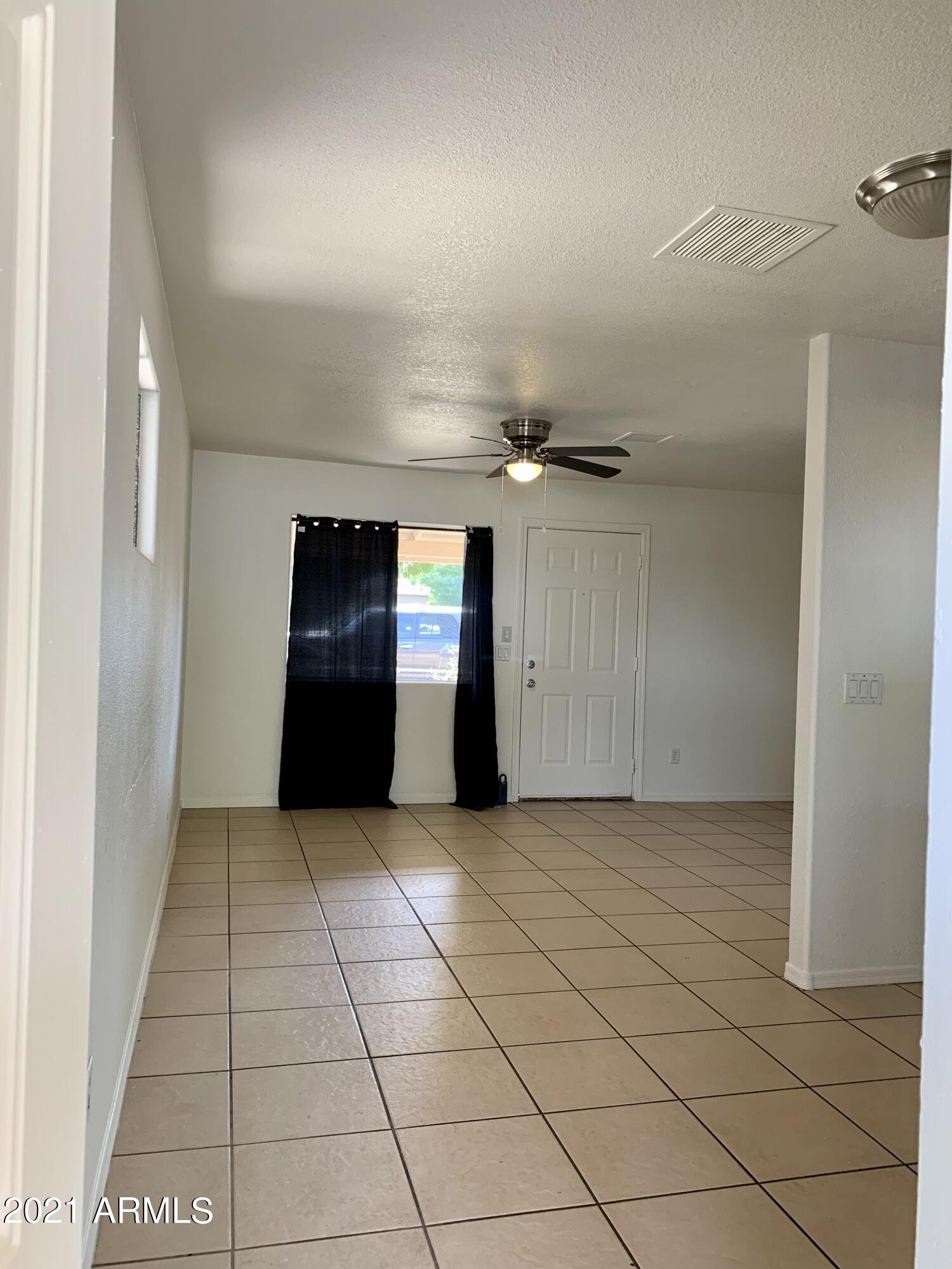 638 West Chipman Road Phoenix, AZ 85041 - Photo 9 of 20 CFA3AF19-14D6-481D-9BBD-23DFD4BE8F39