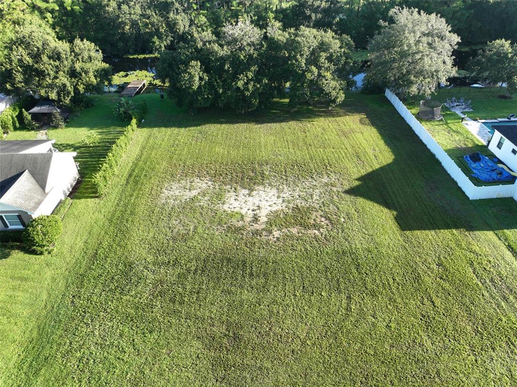 0 Phillips Road, Unit 2 Odessa, FL 33556 - Photo 11 of 22 a view of a lake from a yard