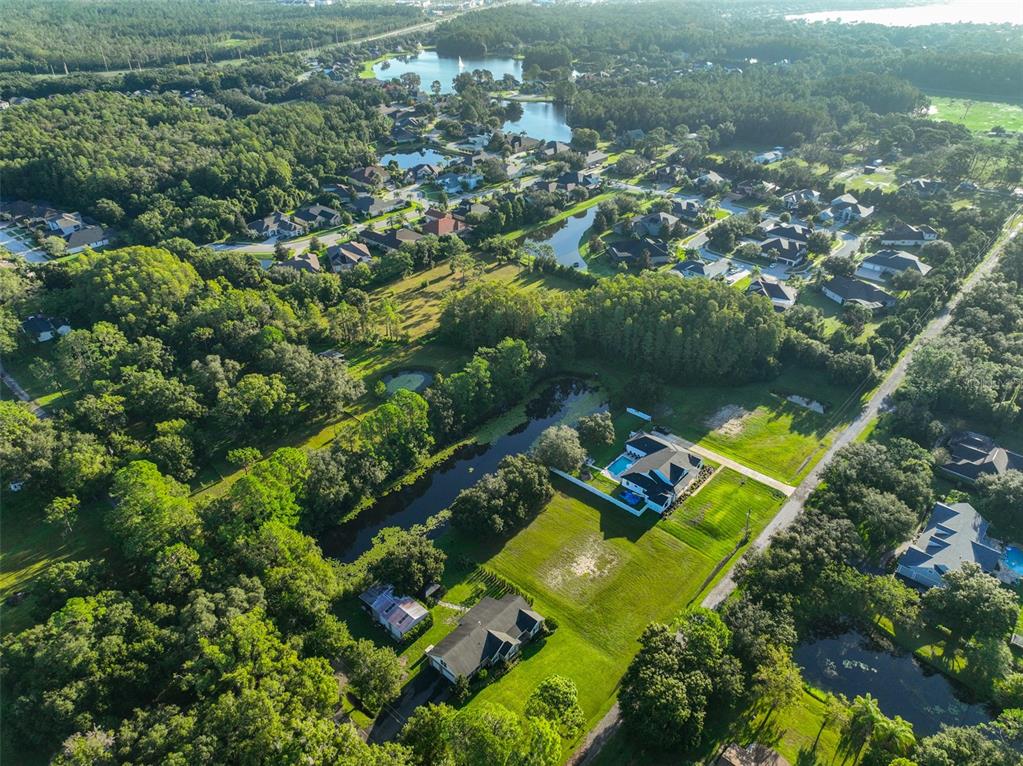 0 Phillips Road, Unit 2 Odessa, FL 33556 - Photo 14 of 22 an aerial view of a house with a yard