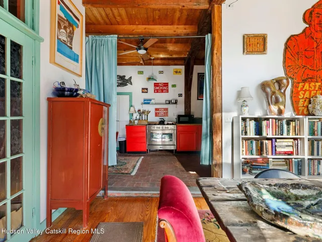 a table and chairs in a patio with a outdoor seating