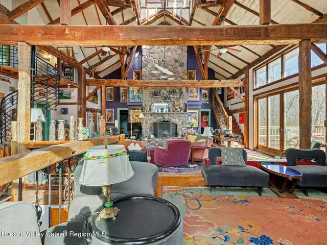 a bedroom with a bed closet and a window