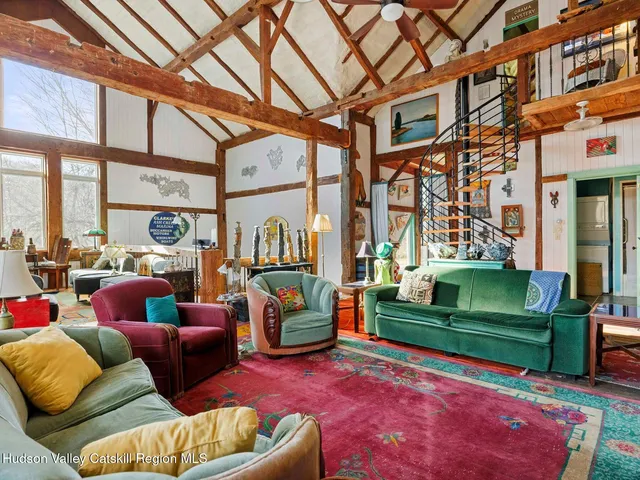 a bed room with a bed and a fireplace