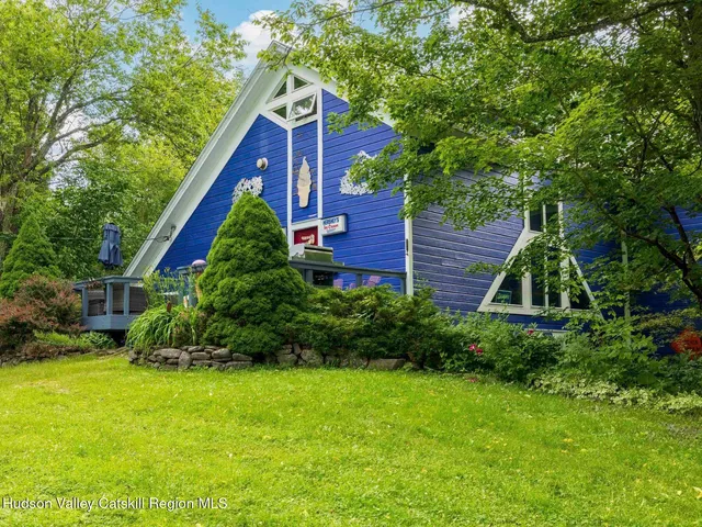 a view of a chairs and a tables in the patio