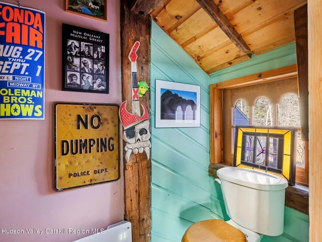 a living room with lots of furniture and decor