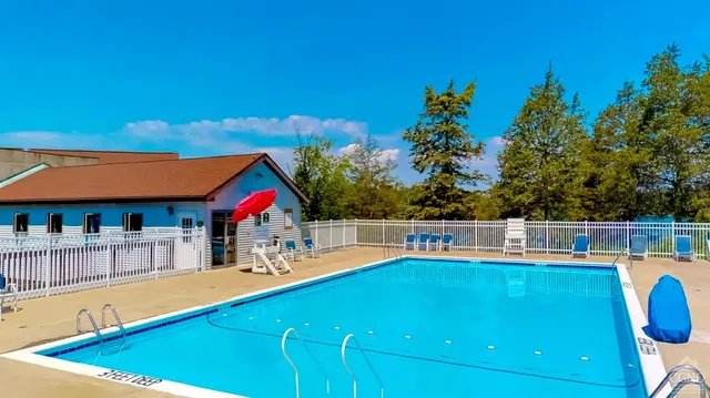 a view of a kitchen with a swimming pool