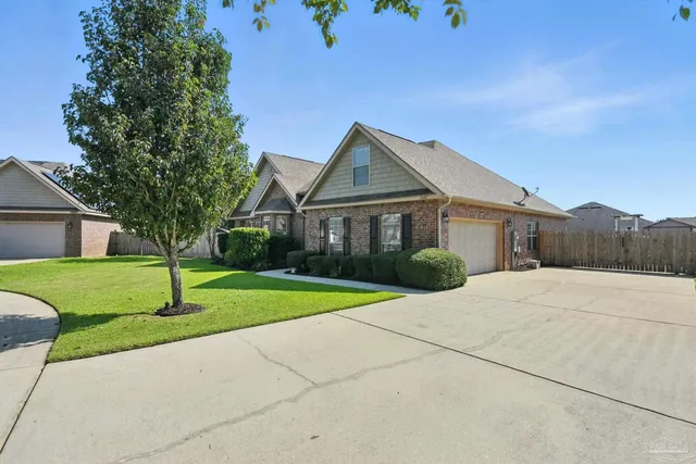 a house with garden in front of it