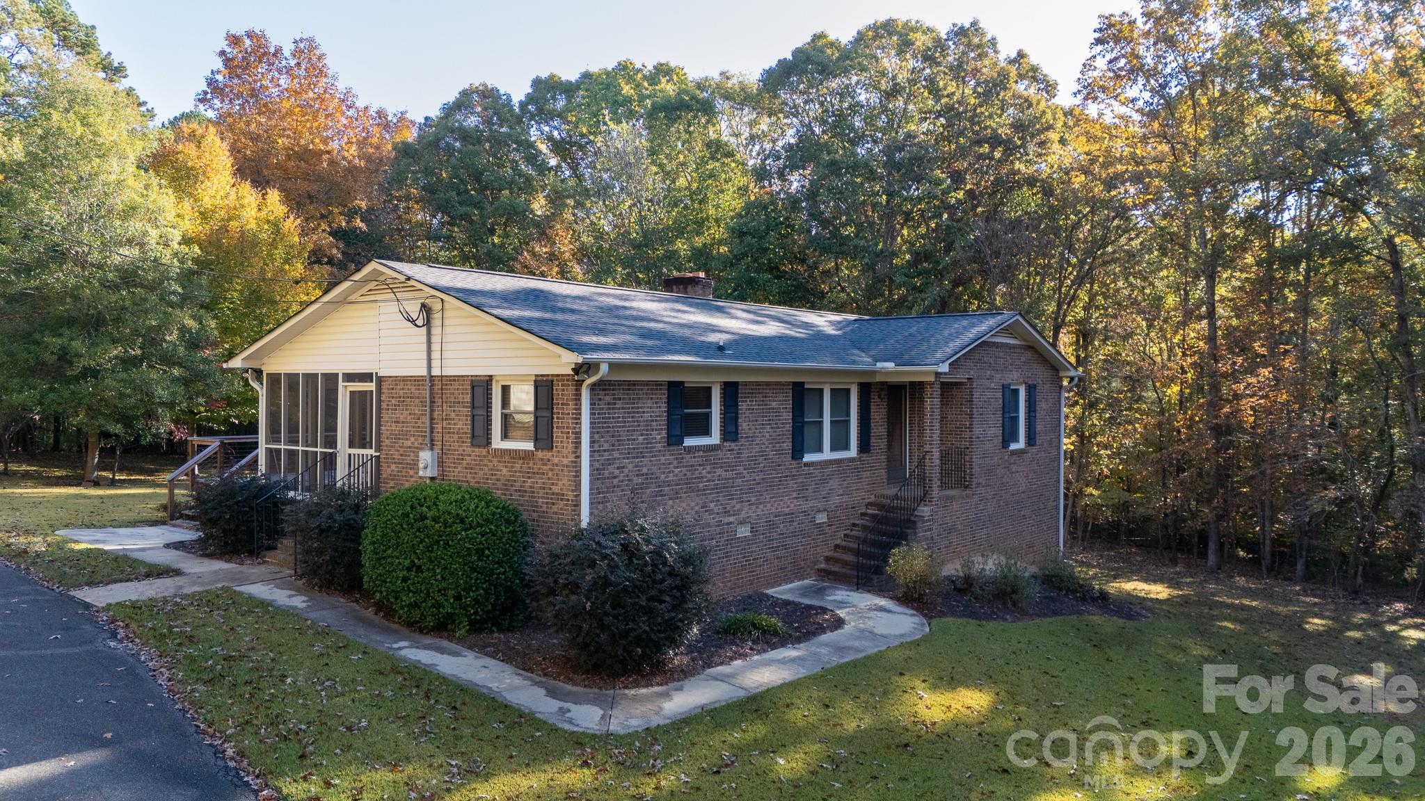 4193 Walker Road Rock Hill, SC 29730 - Photo 2 of 38 a front view of a house with a yard
